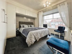 Bedroom One- click for photo gallery